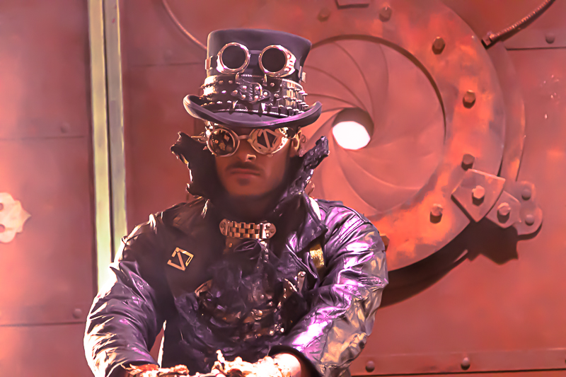 Steampunk man portrait — dramatic lighting on textured costume